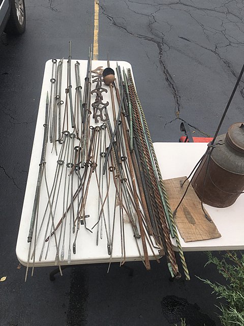 Lightening Rods: Large collection of vintage lightening rods and weathervane stands and poles.