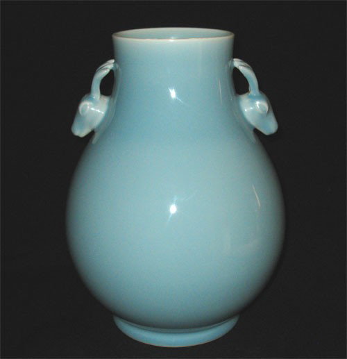 Chinese Monochrome Glaze Zun Vase: Chinese sky-blue (Calm after the storm time sky blue color) glaze Lu Er Zun vase.(The deer's head as a vase ears ) .Six character mark on base "Da Qing Qian Long Nian Zhi".H 13.39",