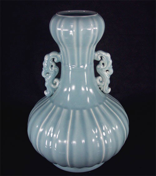 Chinese Monochrome Glaze Vase: Chinese sky-blue(Calm after the storm time sky blue color)glaze garlic-shaped mouth (Shuan Tou) vase. Six character mark on base "Da Qing Qian Long Nian Zhi".H 15.16",