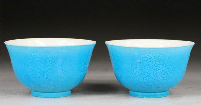 Chinese Pairs Peacock-Green Glaze Tea Cups: Chinese Pairs Peacock-Green Glaze Tea Cups,with carved floral. Six character mark on base "Da Qing Yong Zheng Nian Zhi".H 1.77",Dia 2.95".