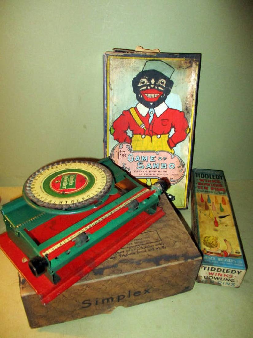 Lot of Two Vintage Games and Child's Typewriter: Lot of two vintage games - The Sambo Game and Tiddlewinks - and a child's Symplex typewriter. The Symplex typewriter is in good condition but all the boxes are in poor condition.