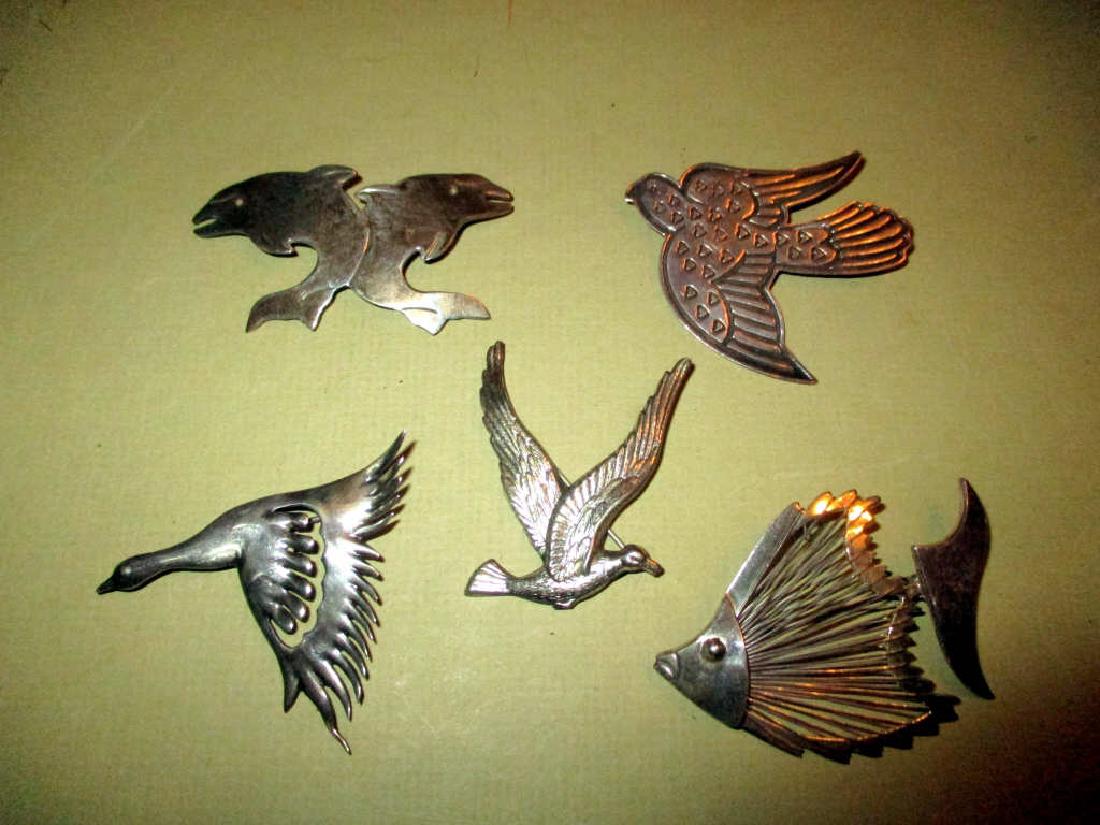 Five Mexican Sterling Vintage Pins: Five sterling vintage pins, in fish and bird motifs. One is signed Coro, others are stamped Mexico. All in good condition.