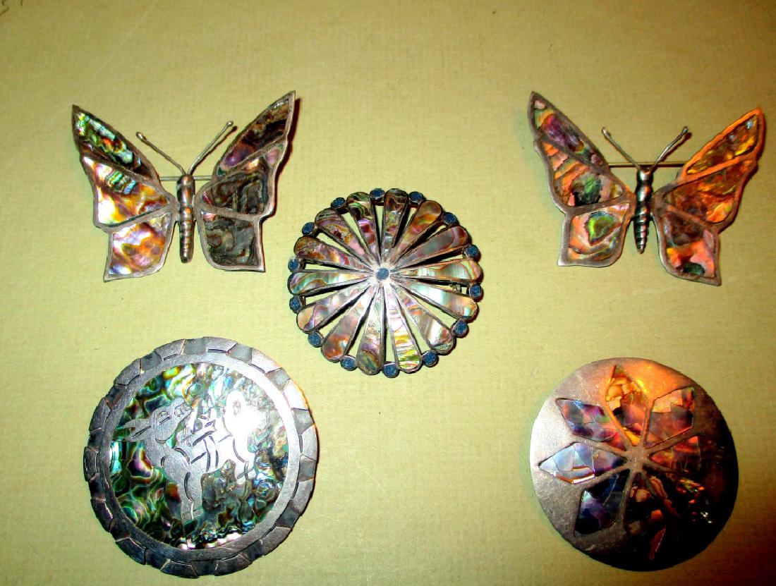 Five Sterling and Inlaid Abalone Vintage Brooches: Five vintage sterling brooches inlaid with abalone, made in Mexico. All in good condition.