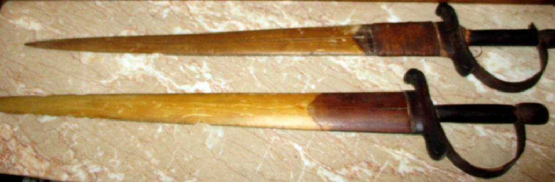 Two Sailor Folk Art Swords (1 of 1)