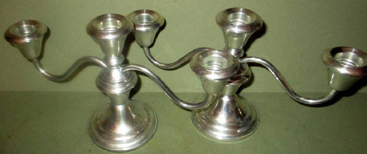 Pair of Three-light Sterling Candleholders: Pair of three-light sterling silver weighted candleholders. In good condition. 5 1/4" in. tall approximately.