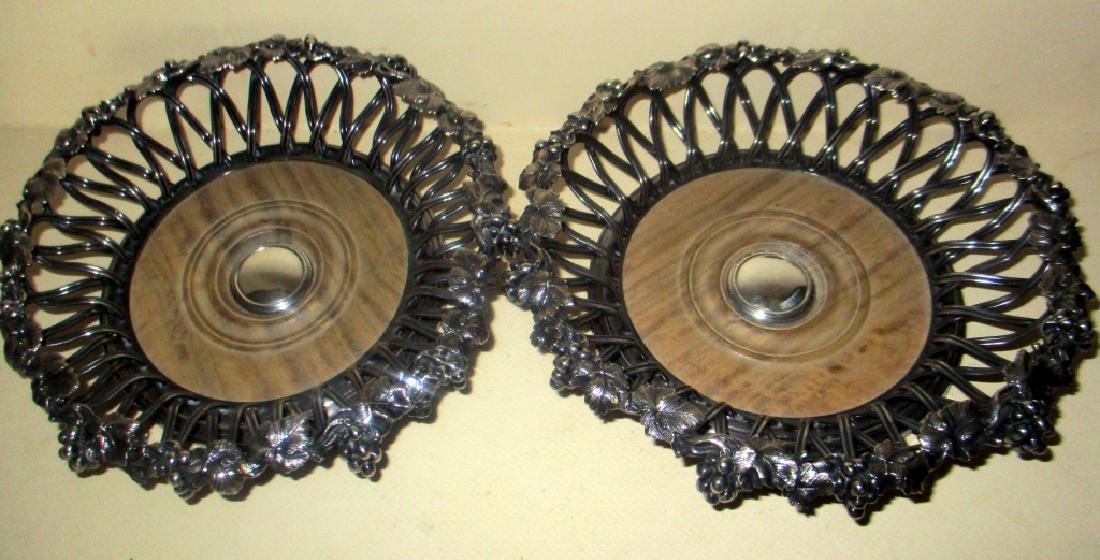 Pair of Wonderful Silver Plate Wine Coasters: Pair of English hall marked wine coasters with approx. a 4 1/2" inch diameter on inside bottom. Very good condition needs a good polishing. They have a grape & cable border.