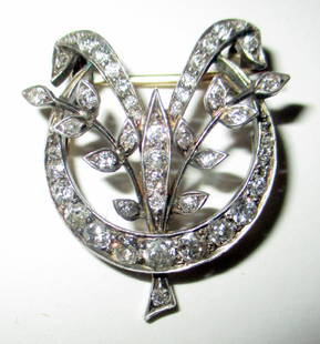 Diamond & Gold Edwardian Brooch: Diamond & Gold Edwardian Brooch with approx. two or more carats of diamonds set in white gold with a backing of yellow gold. Approx. 48 diamonds in all. Good condition.