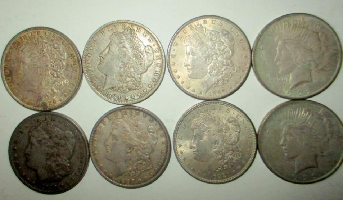 Lot of Eight American Silver Dollars (1 of 1)