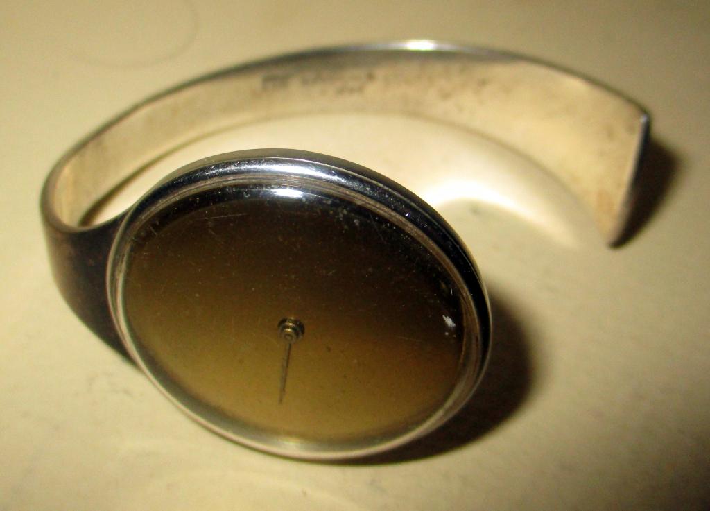 Lady's Mid Century Sterling Watch by Stockmarr: Lady's Mid Century Sterling Watch signed by Jan Stockmarr, Denmark and Swiss made for Ole Mathiesen. Unsure if it is working. Wonderful Danish design.