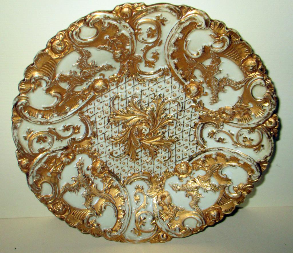 Crossed Swords Mark Meissen Plate: Meissen plate all gilt decorated. It measures approx. 9" inches in diameter. In good condition.