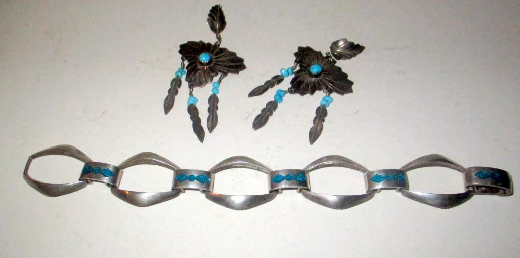 Lot of Sterling & Turquoise Jewelry: Lot of Sterling & Turquoise Jewelry including South Western silver earrings set with turquoise and a sterling bracelet set with turquoise. Good condition.