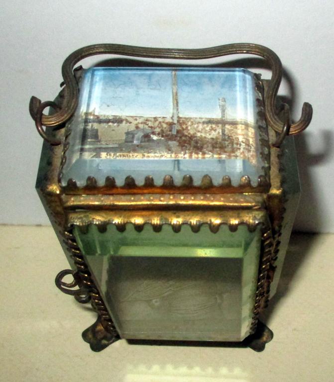 Grand Tour Jewelry Casket: French Grand Tour jewelry case meant to hold a single pendant. It consists of gilt metal and beveled glass top has a miniature reverse painting of St. Mazarius. The interior cushion is frayed but it i