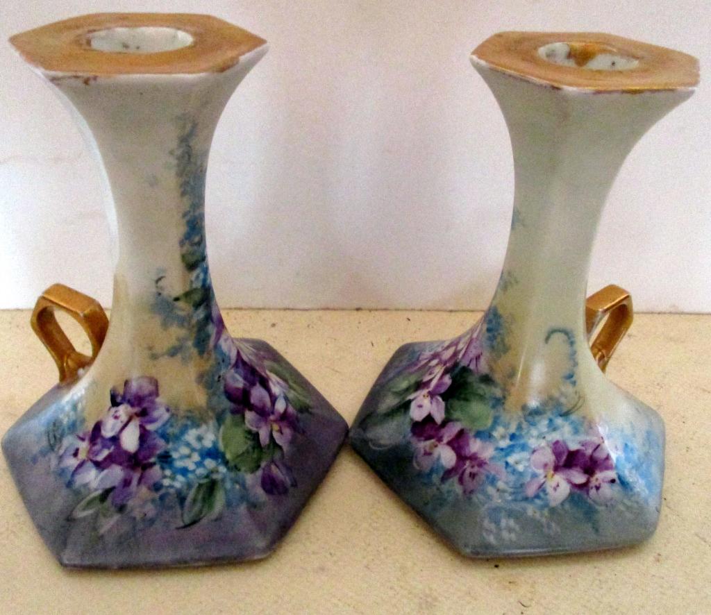 Pr. of Limoges Candlesticks: Pair of T and V Limoges hand painted candlesticks in good condition. Each of them has a finger grip. No chips, breaks, cracks, etc.