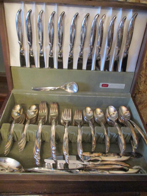 Silver Plate Flatware Service for 16: Silver plate flatware service by Roger Brothers. Complete for 16 with 5 piece place settings and many extras. In good condition.