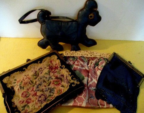Loy of Vintage Purses: Lot consists of petite point purse, a mesh metal purse and a little girls change purse of leather, the mesh purse has slight tear at the hinge, fair to good condition
