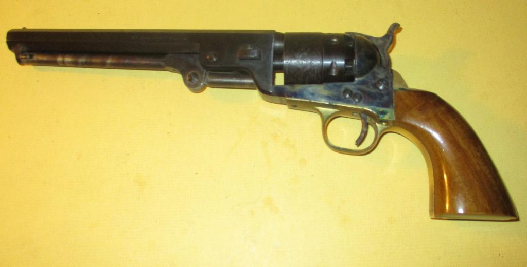 Italian Black Powder Cap& Ball Revolver: Lot consisting of a 44 Cal. Navy model black powder cap and ball revolver. Made in 1941 and is in fair to good condition. Comes with leather holster.