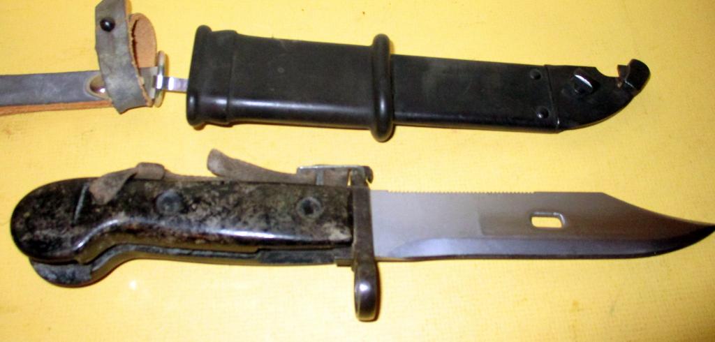 Bayonet & Scabbard: Lot consists of a short bayonet with scabbard. It is not signed. Approx. size is 13" inches long including scabbard. Fair to good condition.