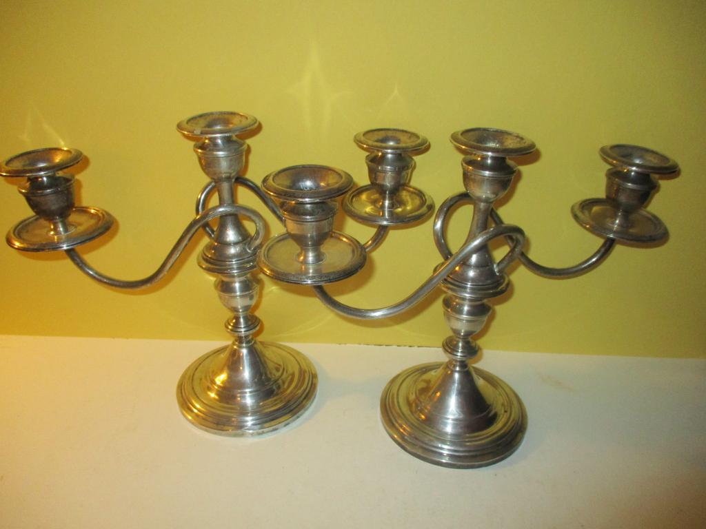 Pair of 3 Light Sterling Candelabra: Lot consists of a pair of 3 light sterling candelabra. They are weighted and good quality. Approximate size of both is 10" inches tall and 13" inches wide. Except for a couple of minor dents they are 