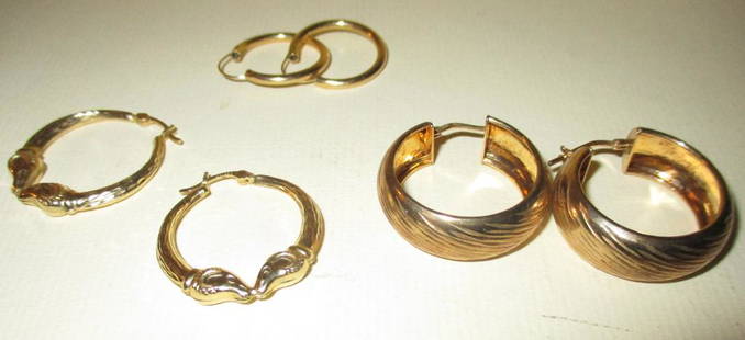 2 Pair of 14k Gold Earrings & a sterling pair: Consists of 2 Pair 14K Yellow Gold Pierced Earrings and 1 pr, of sterling earrings all in good condition, approximate weight of gold is 2.30 dwt.