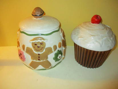 Two Vintage Cookie Jars: One is Gingerbread Man Cookie Jar, Approximate 9 1/2" inches Tall and Cup Cake Cookie Jar, Approximately 8 1/2" inchesTall. Both in Good Condition. Both have USA on Bottom.