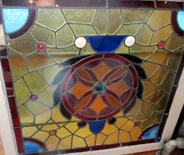 Leaded Stained Glass Window: Consists of a Victorian Stained Glass Leaded Window, Set with Some Jeweled Glass Pieces. Approximate Size is 28" inches by 30" inches End to End of Frame. Two of the amber Pieces have Minor Cracks