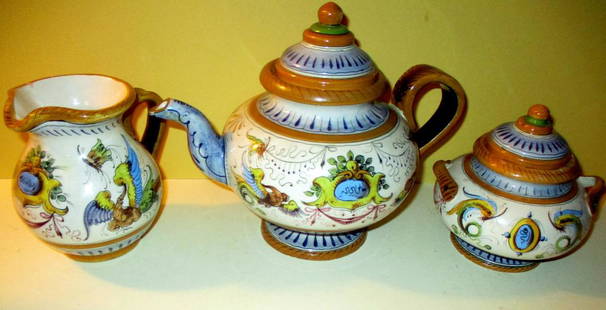 Three Piece Faience Tea Set: Consists of a Teapot, Sugar and Creamer made to Cantigale, Italy. All in Good Condition. No Cracks or Breaks.