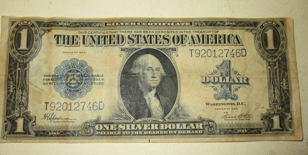 Large One Dollar Silver Certificate: Consists of a Large One Dollar Silver Certificate, 1923 Series. In Fair Condition