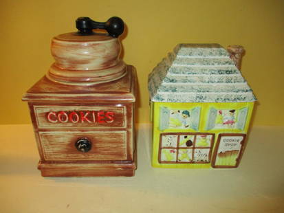 Two Vintage Cookie Jars: Lot Consists of McCoy Cookie Jar in an Antique Coffee Grinder Motif. Approximate Size is 10" inches Tall, Signed McCoy. The Other is a Cookie Jar in a Shop Motif, Not Marked. Both in Good 