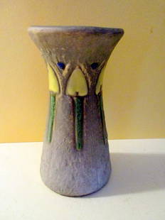 Roseville Mostique Vase: Consists of an Unsigned Roseville Mostique Vase. In a Muted Green Color with Yellow Tulips. Approximate Size is 6" inches Tall. In Fair to Good Condition.