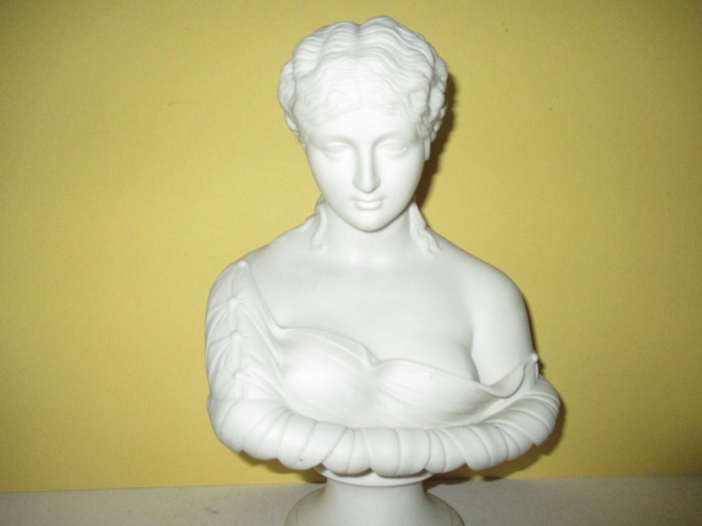 Classical Parian Bust of Clytie: Lot Consists of an Antique Parian Classical Bust of Clytie. In Very Good Condition. Approximate Size is 11" Inches Tall.