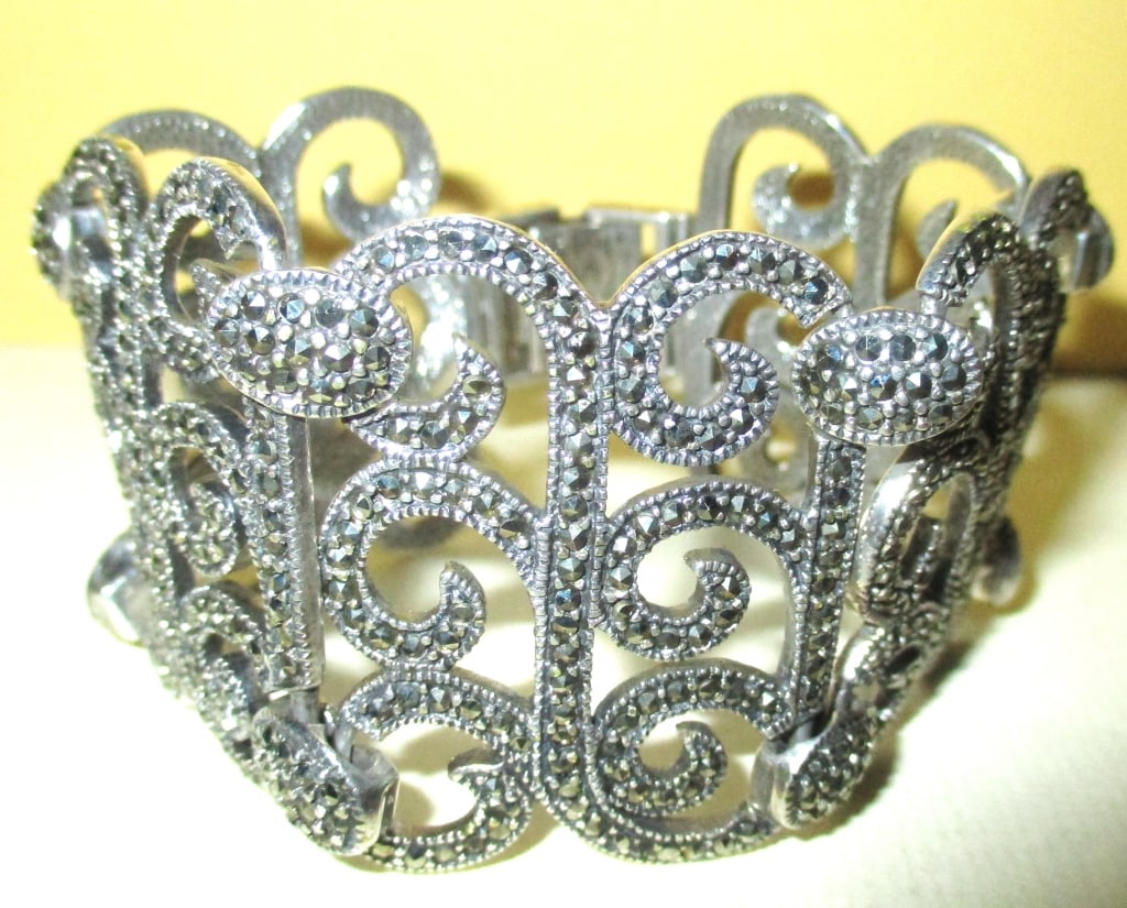 Sterling Cuff Bracelet, Circa 1920: Lot Consists of a Sterling Cuff Bracelet Set with Marcasite Stones. It is Approximately 1 3/4" in Width and Approximately 7" inches Long . In Good Condition and Circa 1920.
