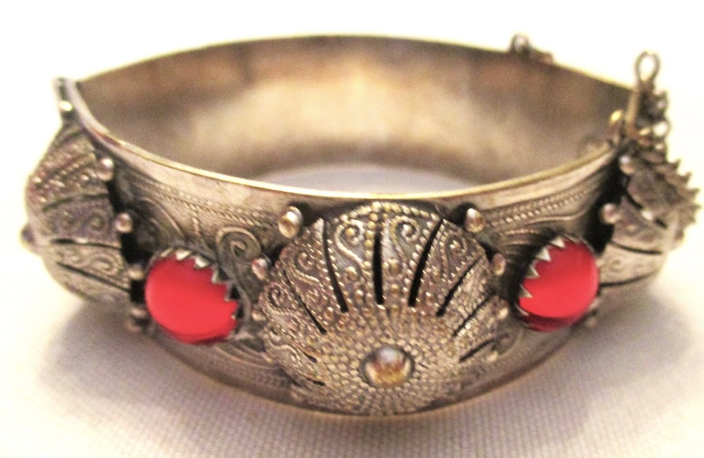 Turkish Silver Cuff Bracelet: Lot Consists of a Turkish Silver Cuff Bracelet. Approximate Diameter is 2 1/2" inches. It is Set with Red Cabochon Stones. In Good Condition. Approximate Weight is 1.45 ozt