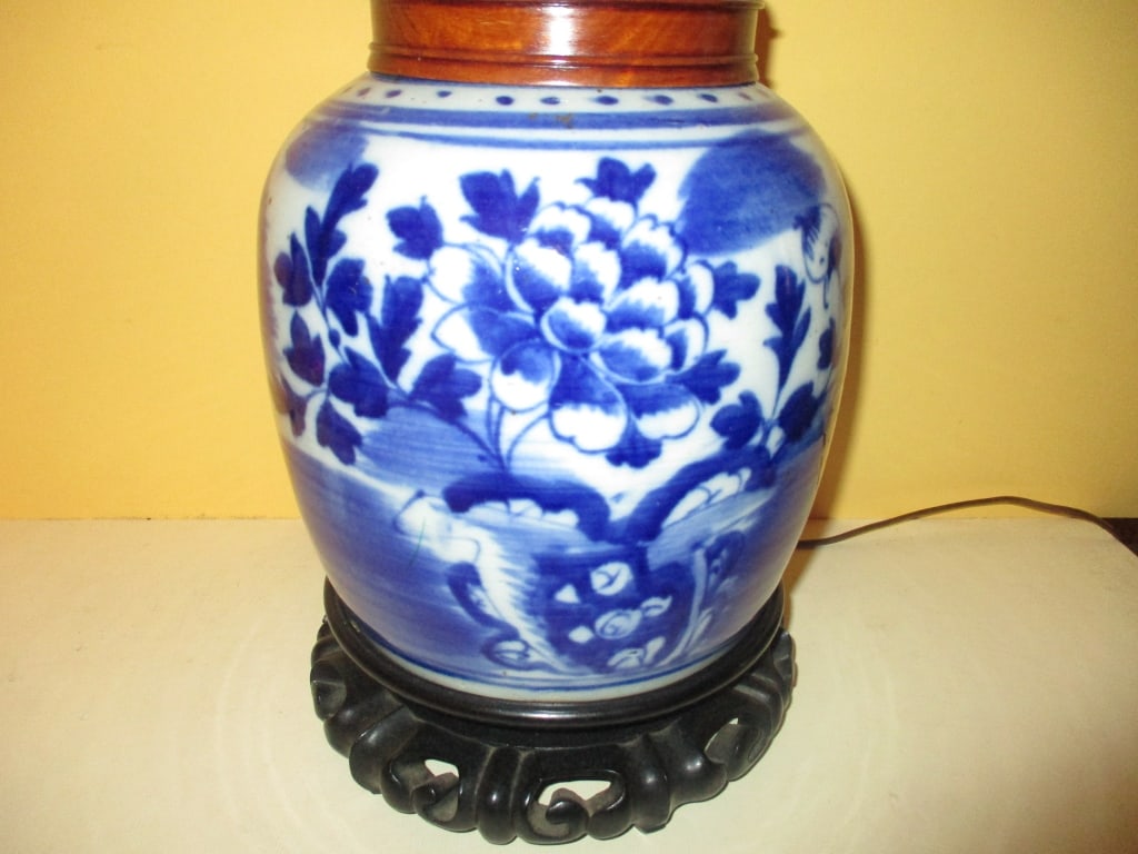 Chinese Antique Lamp: Lot Consists of an Antique Chinese Lamp With a Blue and White Porcelain Base. Most Likely it Was a 19th Century Chinese Ginger Jar. Approximate Size is 23" Inches to the Top of the harp or Finial. In