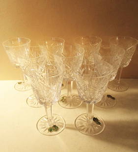 Lot of Waterford Wine Stems: Lot Consists of 9 Waterford Signed Wine Stems. All are in Good Condition. Some of Them Have Paper Stamps and all are Signed Waterford with an Etched Waterford Mark.