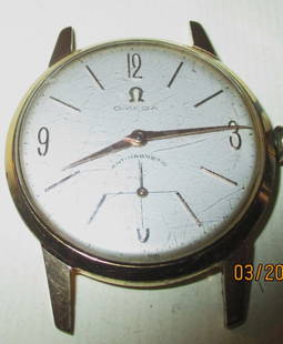 Gold Filled and 18k Gold Filled Base Omega Man's Wristwatch: Lot Consists of a Man's Omega Wristwatch with 18K Gold filled Base and Gold Filled on the Outer Watch Face Rim and the Wrist Band Holders. Watch is Working. There is no Band.