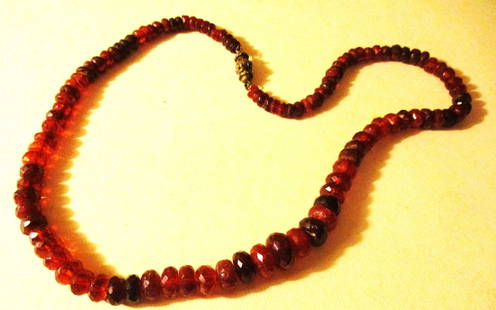 Vintage Amber Necklace: Lot Consists of a Beautiful Amber Bead Necklace. The Beads are Cutting in Facets and are all Graduated with Small on the Ends and Larger to the Middle. The Age is Circa 1900 to 1920's. Length is