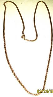 18K Gold Neck Chain: Lot Consists of an Unusual 18K Gold Neck Chain. The Gold Links are in Box Design. Approximate Weight is 12 dwt and Approximate Length is 27" Inches Long. Is is in Good Condition.