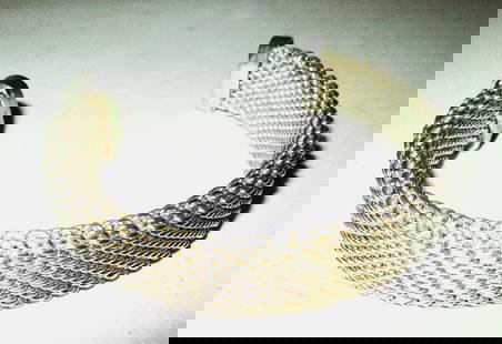 Sterling Mid Century Bracelet: Lot Consists of a Mid Century Sterling Cuff Bracelet. In Very Good Condition. The Approximate Weight is 1.95 ozt. Marked with 925 with a Hallmark.