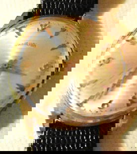 14K Gold Hamilton Man's Watch: Lot Consists of a Man's Hamilton 14K Gold Watch. It has a Lizard Wrist Band. The Approximate Weight is 18 dwt. It is in Good Condition and it Works.