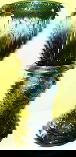 Majolica Planter and Pedestal: Lot Consists of a Majolica Planter and Pedestal. The Planter has a Motif of Calla Lilies. Approximate Size is 26" Inches Tall With a Diameter of 11" Inches. Both are in Good Condition.