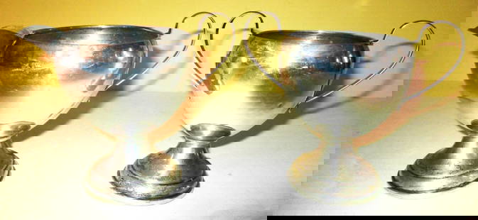 Sterling Sugar and Creamer: Lot Consists of a Weighted Sterling Sugar and Creamer. In Fair Condition With Some Minor Dents.