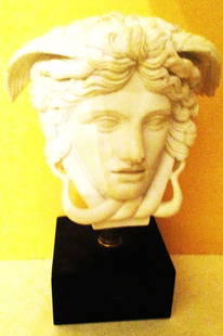 Marble Sculpture of Medusa: Lot Consists of a Sculpture of Medusa's Head. Most Likely it is a Reproduction. Approximate Size is 10" Inches Tall and 7" Inches Wide. Probably Mid Century. In Good Condition. I believe this 