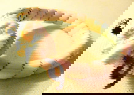 Coral Angel Skin Bracelet: Lot Consists of a Carved Coral Angel Skin Bracelet With Sterling Mounts in a Serpent Motif. Approximate Size is 8" Inches Long. The Bracelet is Unusual and Beautiful. In fair to good Condition.