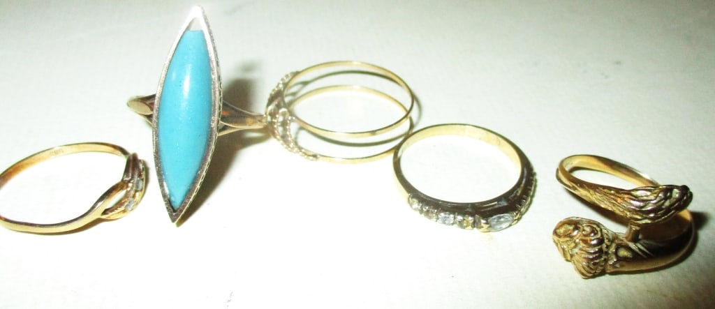 Lot of 5 14K Gold Rings: Lot Consists of 5 14K Gold Vintage Rings. The Approximate Weight is 5.7 dwt. One Ring Has a Snake Motif. It is Approximately Size 7. The Others are Various Sizes From 6 to 8. All in Good Condition.