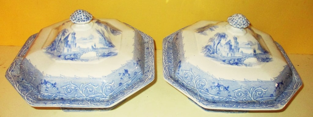 Pair of Covered Transfer Vegetable Bowls: Lot Consists of a Pair of T.J. & J. Mayer Transfer Covered Vegetable Bowls. One Bowl Has a Very Minor Chip on a Corner. The Approximate Size is 9" Inches by 9" Inches. In Fair Condition With Some Stai