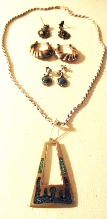 Lot of Vintage Sterling Jewelry: Lot Consists of a Sterling Pendant Set With Turquoise Hanging from a Sterling Roped Necklace, Chain is 18" Inches Long. Also With This Lot are 3 Pair STerling Earrings. Some are Set With Stones. Appro