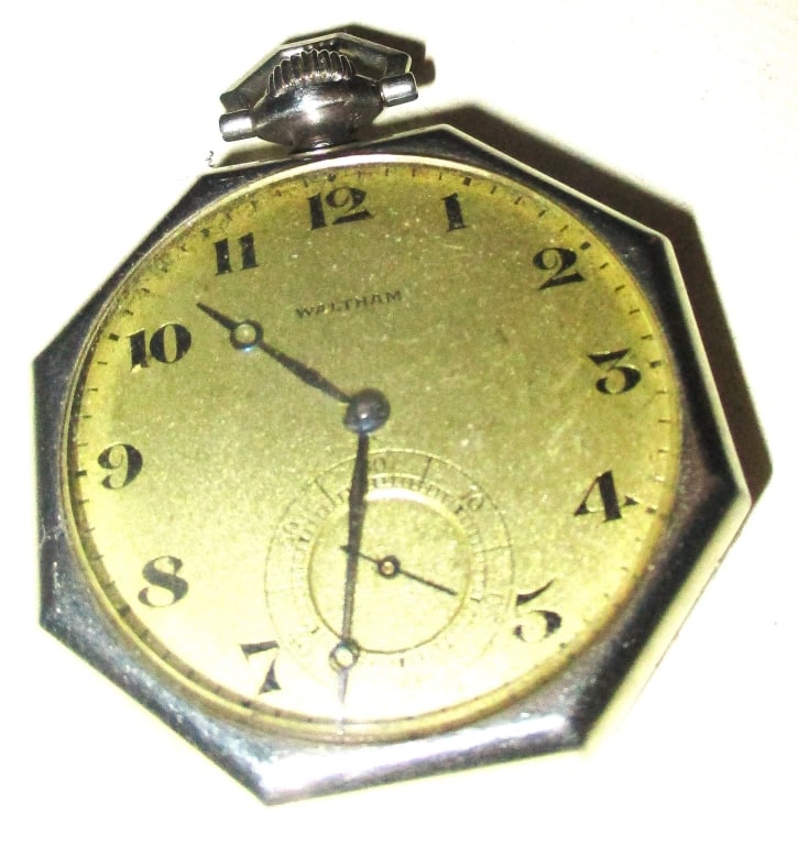 White 14K Gold Man's Pocket Watch: Lot Consists of a 14K White Gold Man's Pocket Watch. Seems to be Working? It is Made by Waltham Co. Approximate Diameter of the Face is 1 1/2" Inches. In Fair to Good Condition.