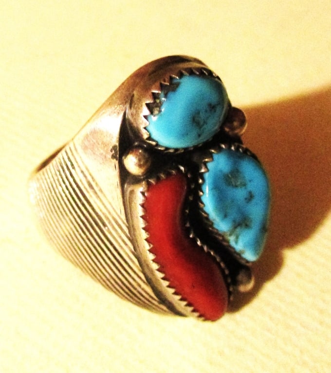 Southwest Navajo Man's Ring: Lot Consists of a Man's Southwest Navajo Silver Ring Set with Turquoise and Red Coral Stone. Size is Approximately 12. Total Weight is Approximately .70 ozt. In Good Condition.