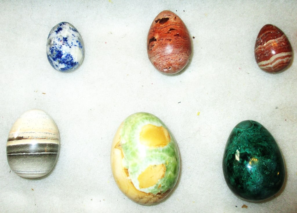 Six Semi Precious Stones in Egg Forms: Lot Consists of Six Egg Form Semi Precious Stones. All are Mineral? Gem Stones. One is a Madagascar Jasper, Another is a Malachite, One is Blue/White Jasper, One is Orange Jasper, Another is Sea