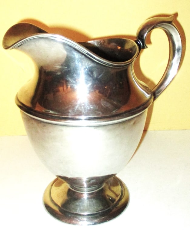 Sterling Pitcher: Lot Consists of a Sterling Pitcher With a Capacity of 3 Pints. Approximate Size is 9" Inches Tall. The Approximate Weight is 16.25 ozt. The Condition is Fair to Good, It has a Few Minor Dents.